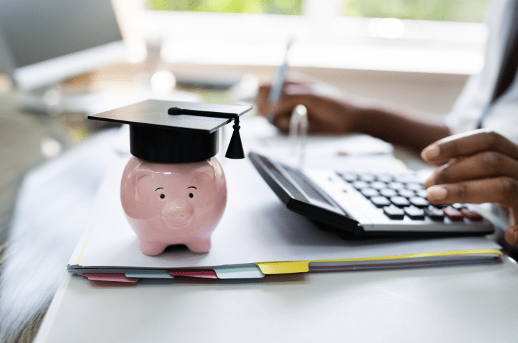 piggy bank with a graduation cap